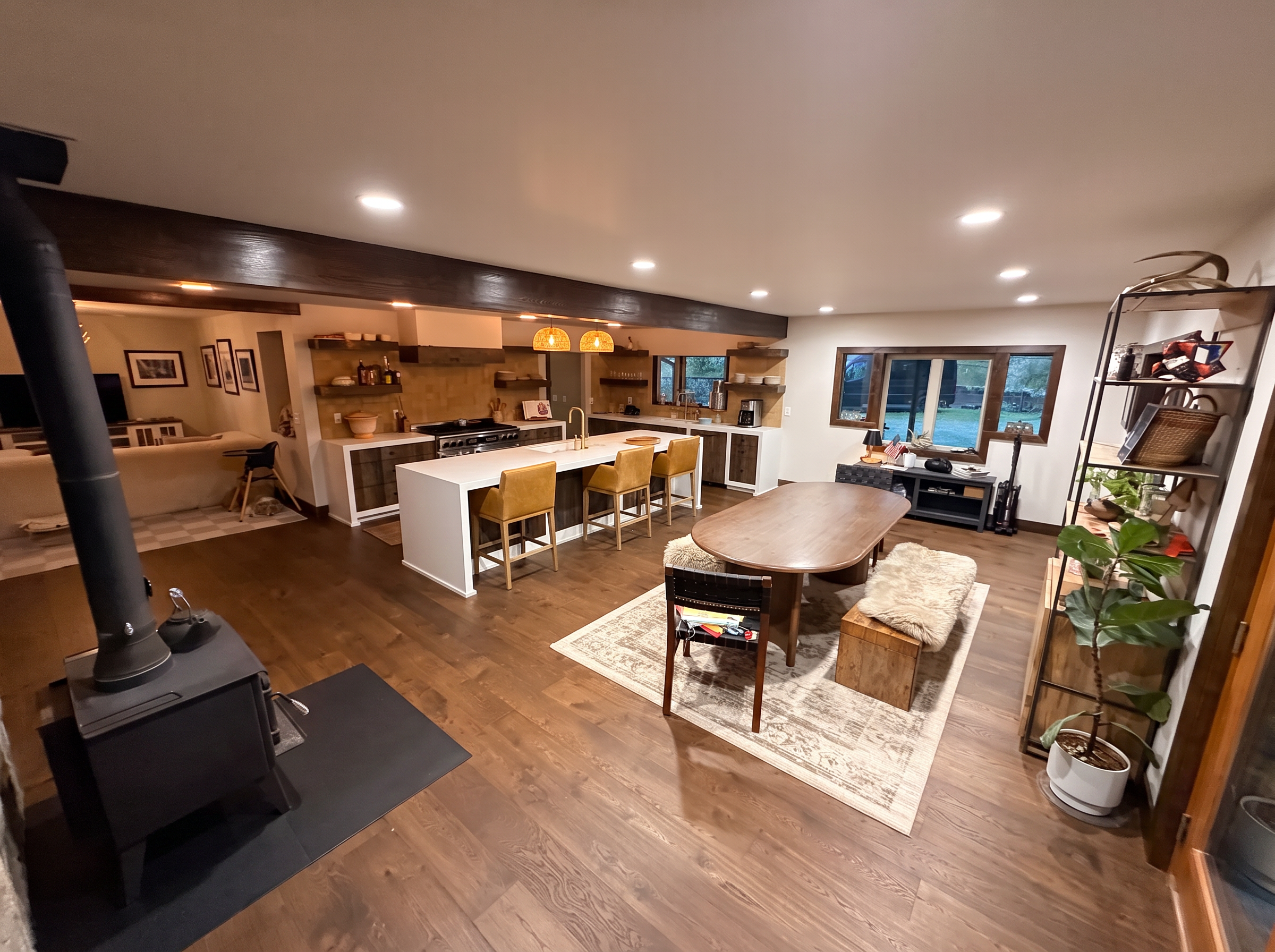 The open living and dining space of the main home